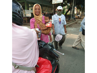 Pembagian Tajil Berbuka Puasa oleh MT Astra Insani